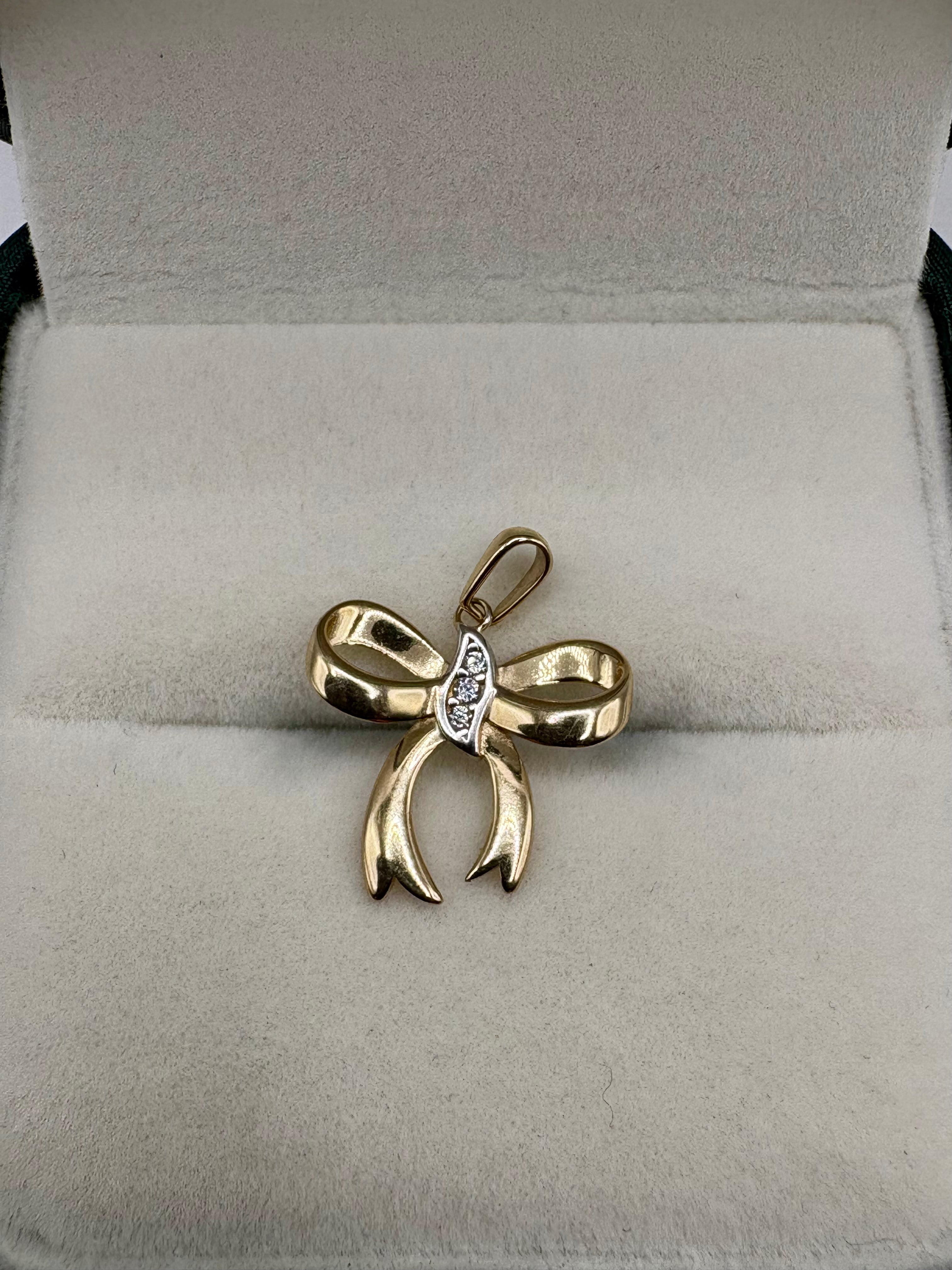 9ct gold diamond bow pendant