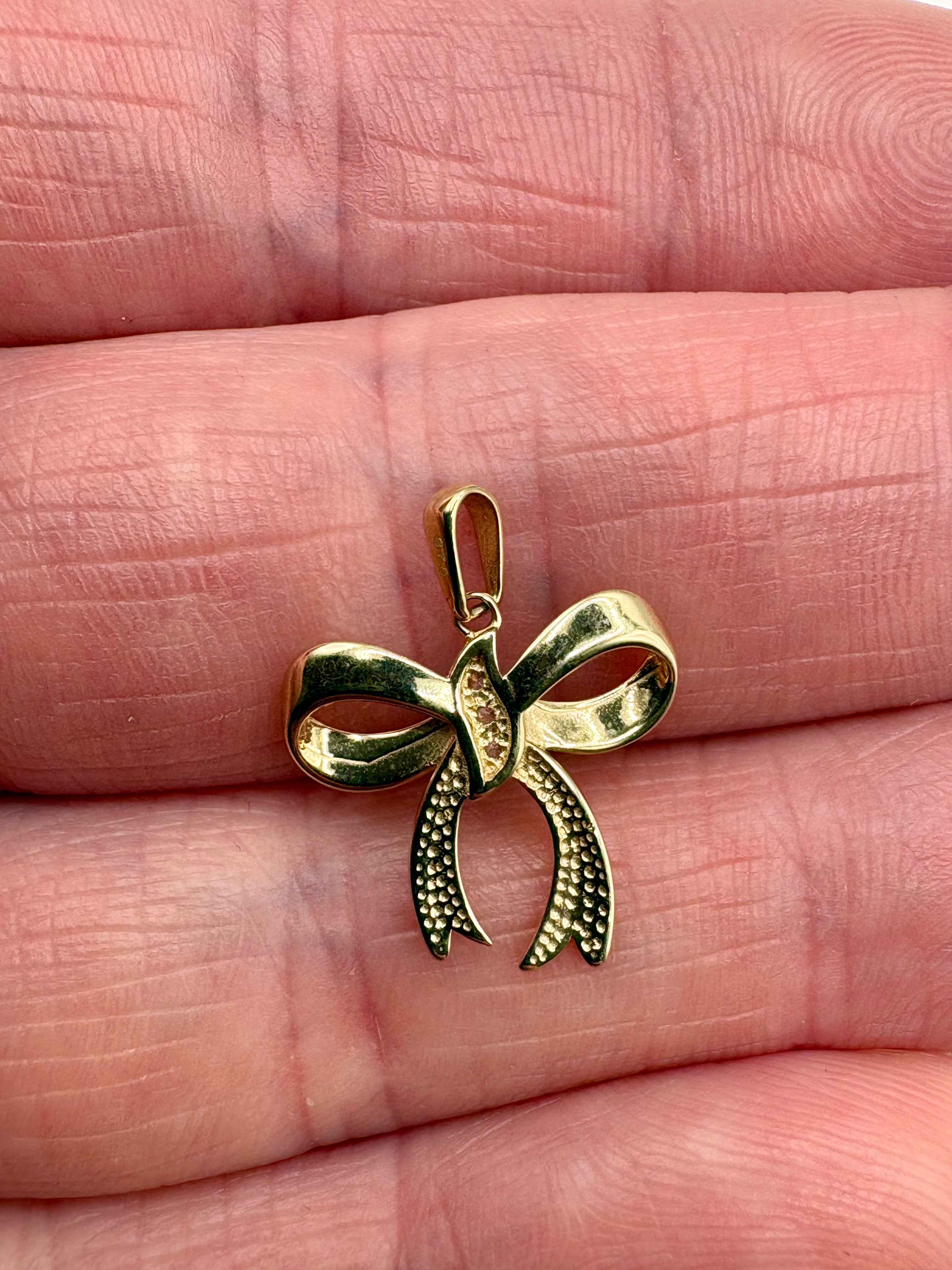 9ct gold diamond bow pendant