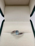 9ct white gold topaz and diamond ring