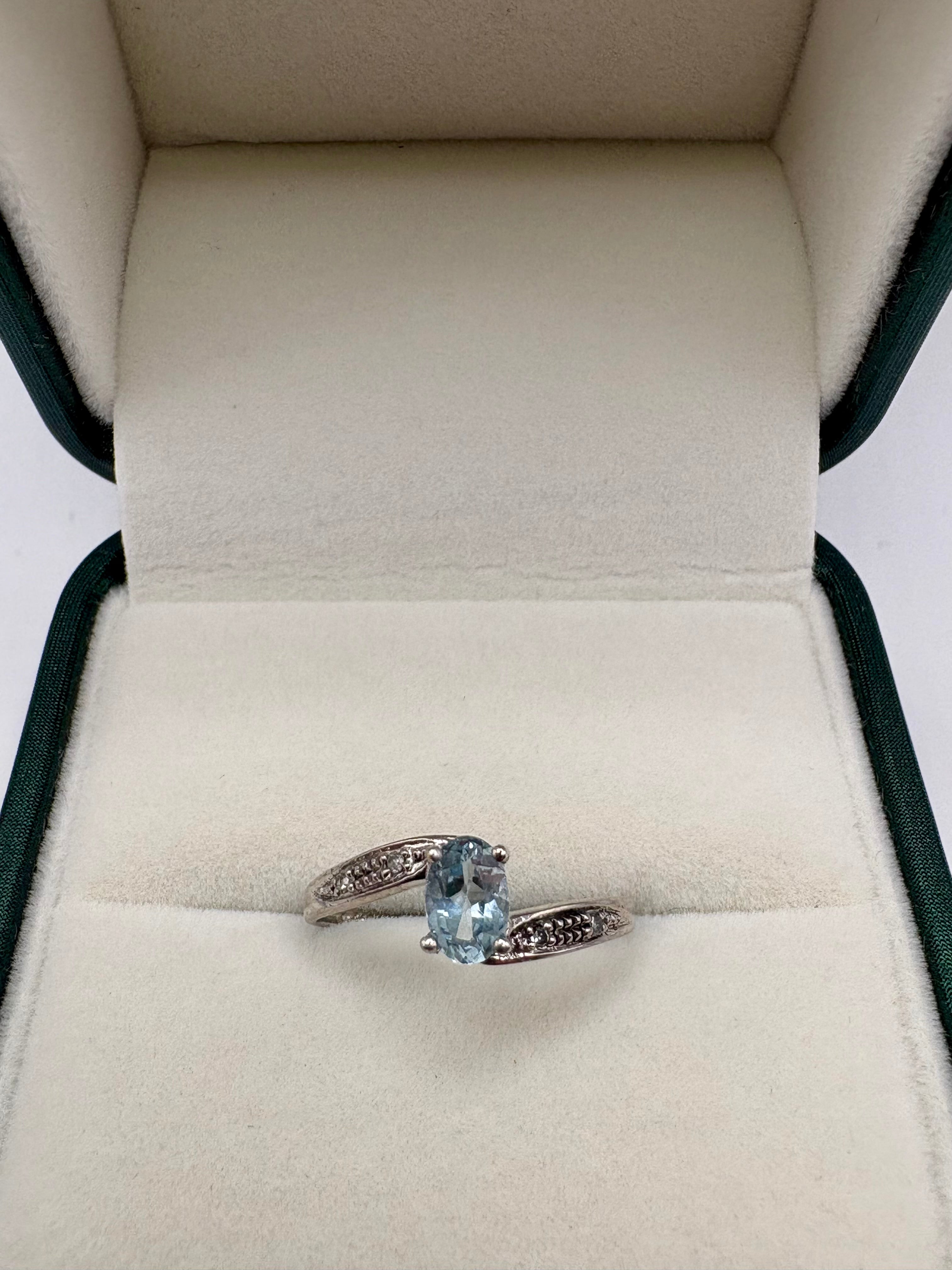 9ct white gold topaz and diamond ring