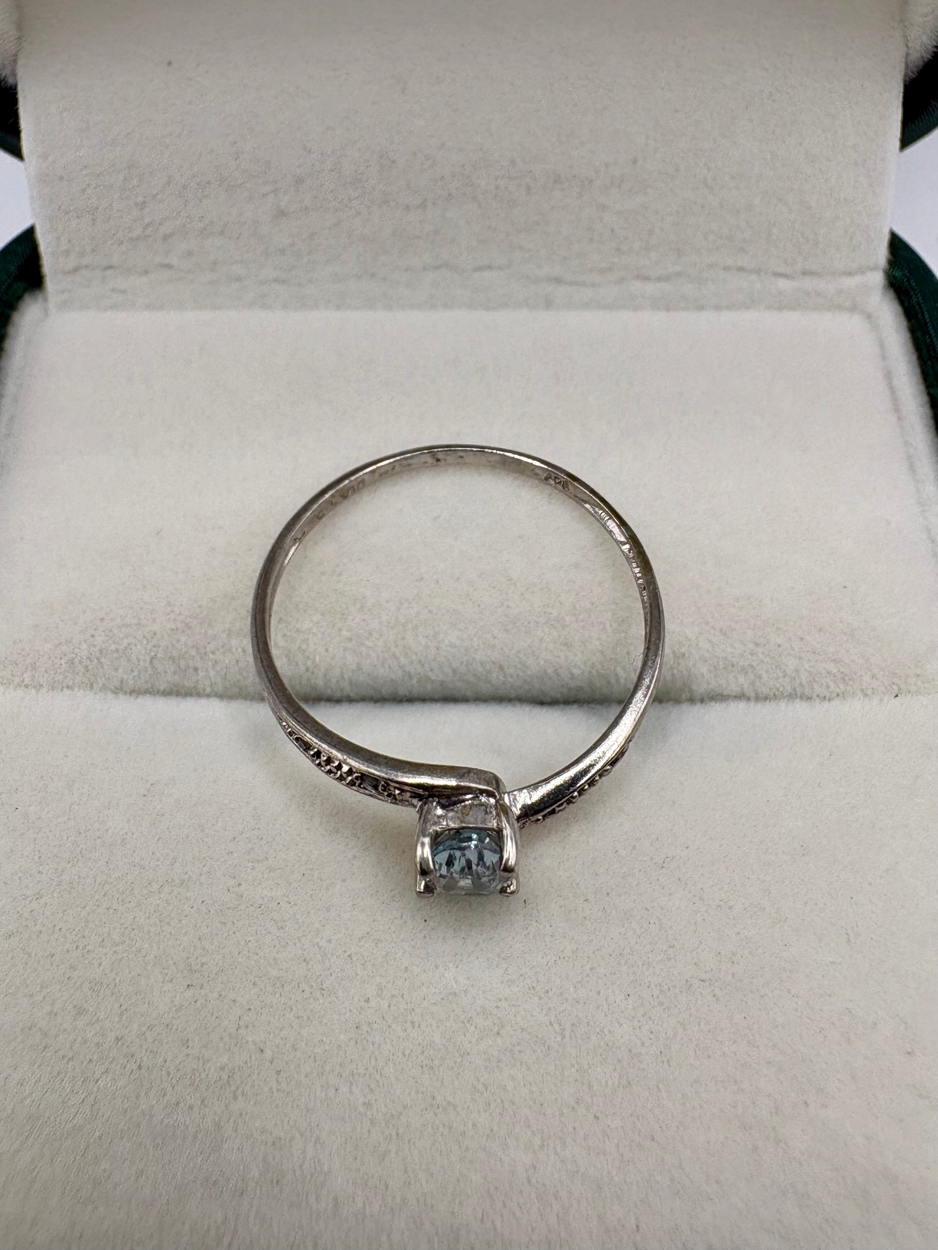 9ct white gold topaz and diamond ring