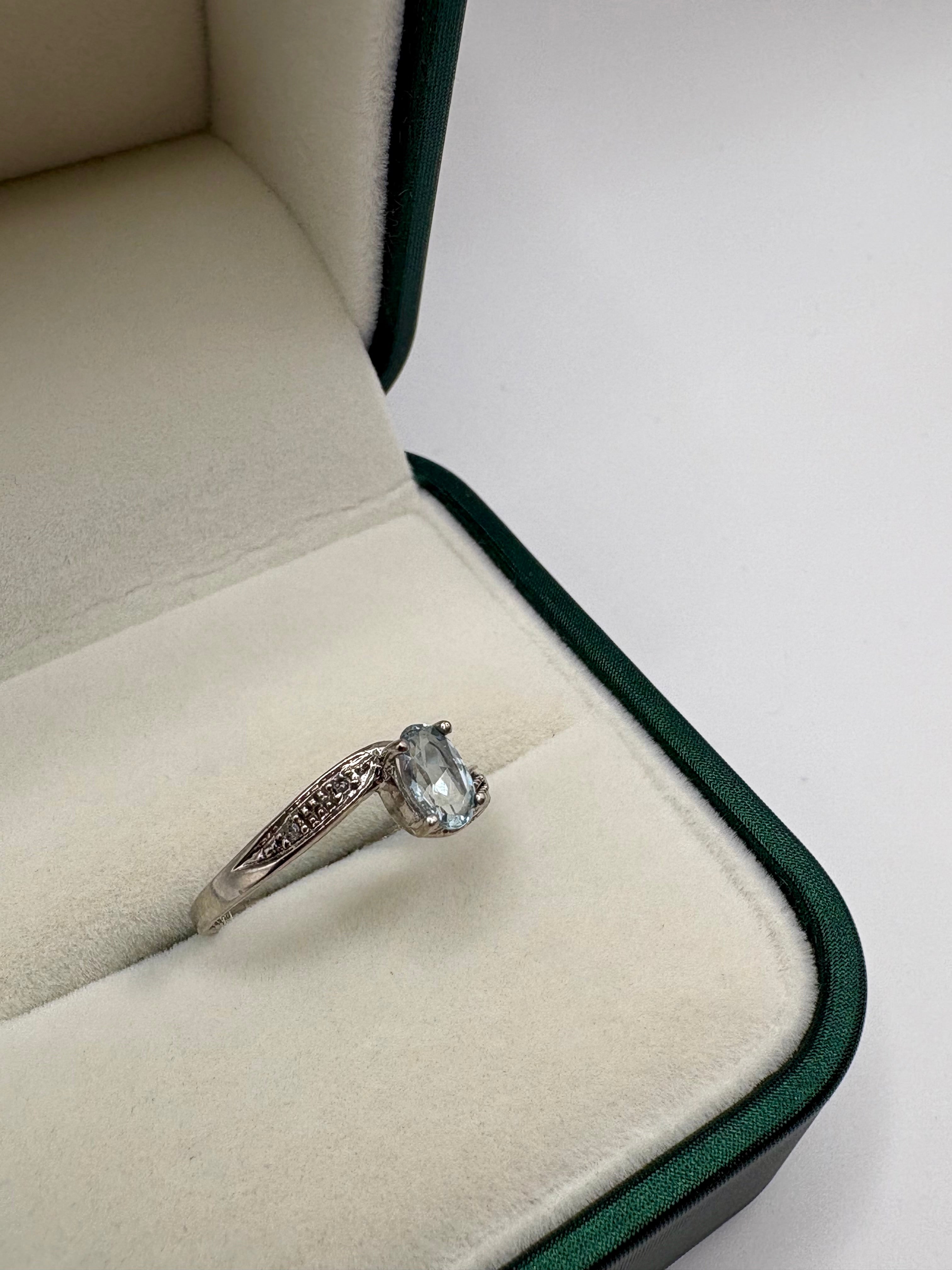 9ct white gold topaz and diamond ring