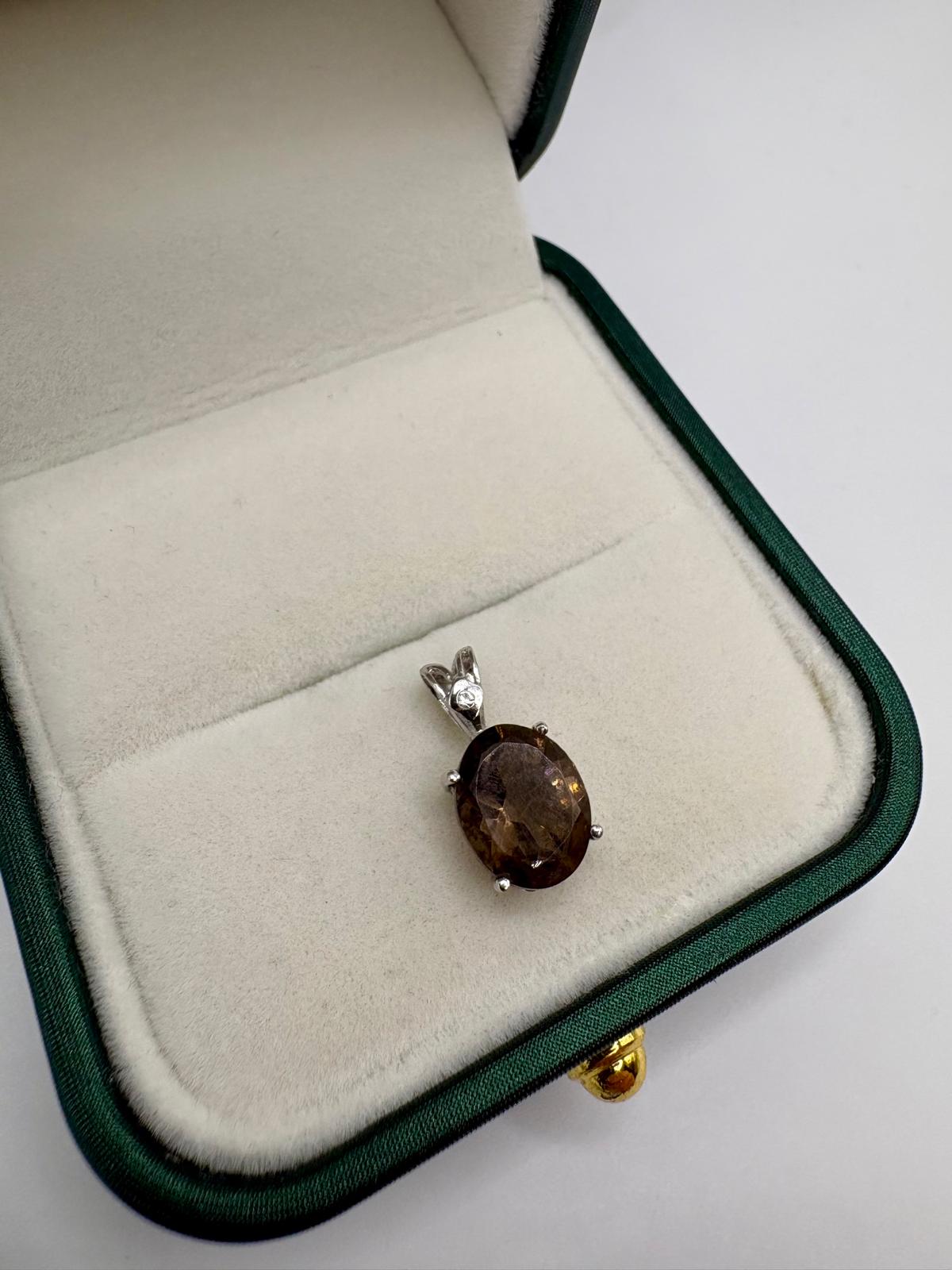 9ct white gold diamond and smokey quartz pendant