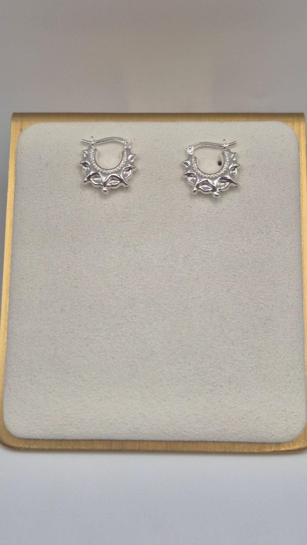 Silver spike creole earrings