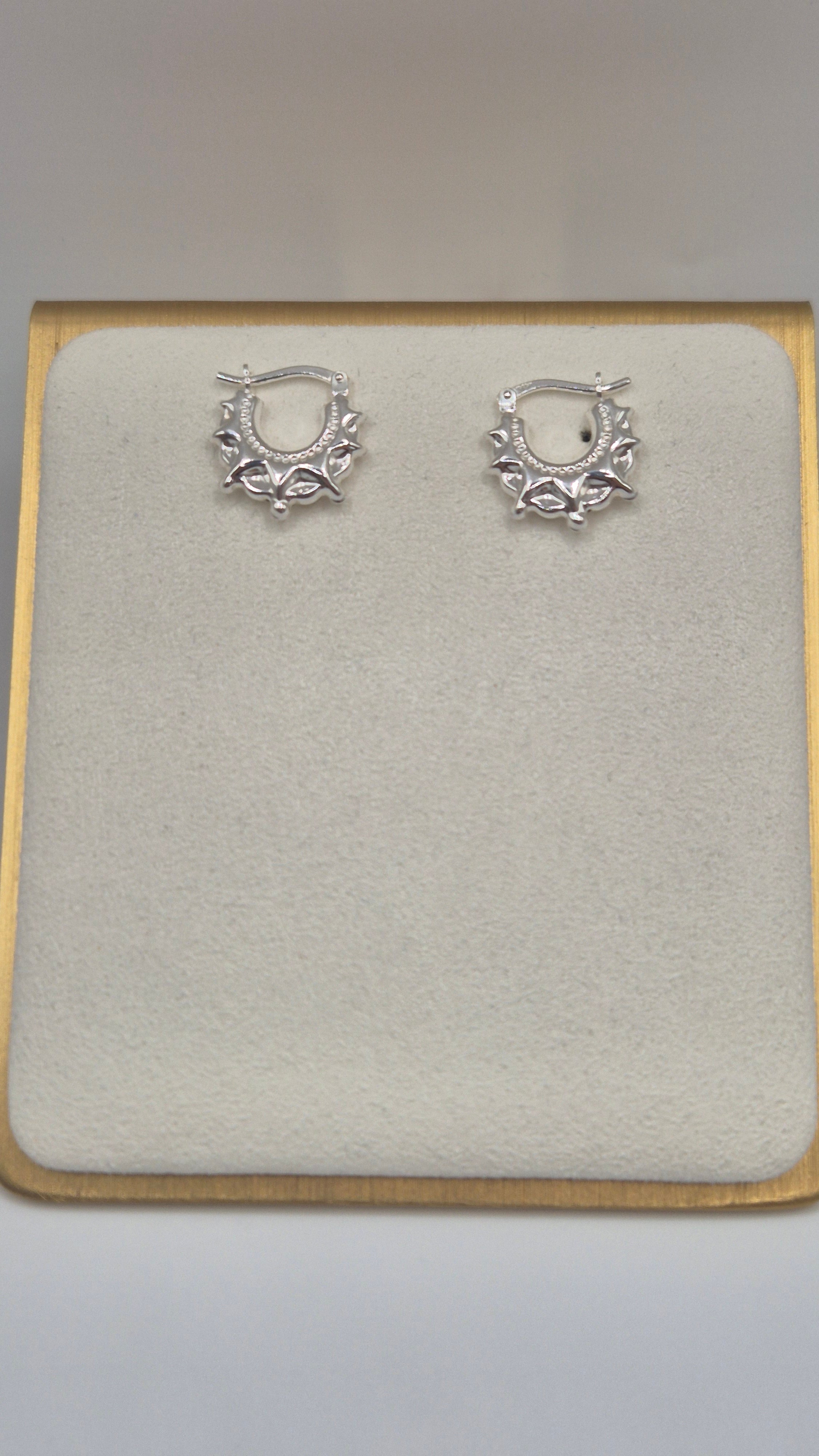 Silver spike creole earrings