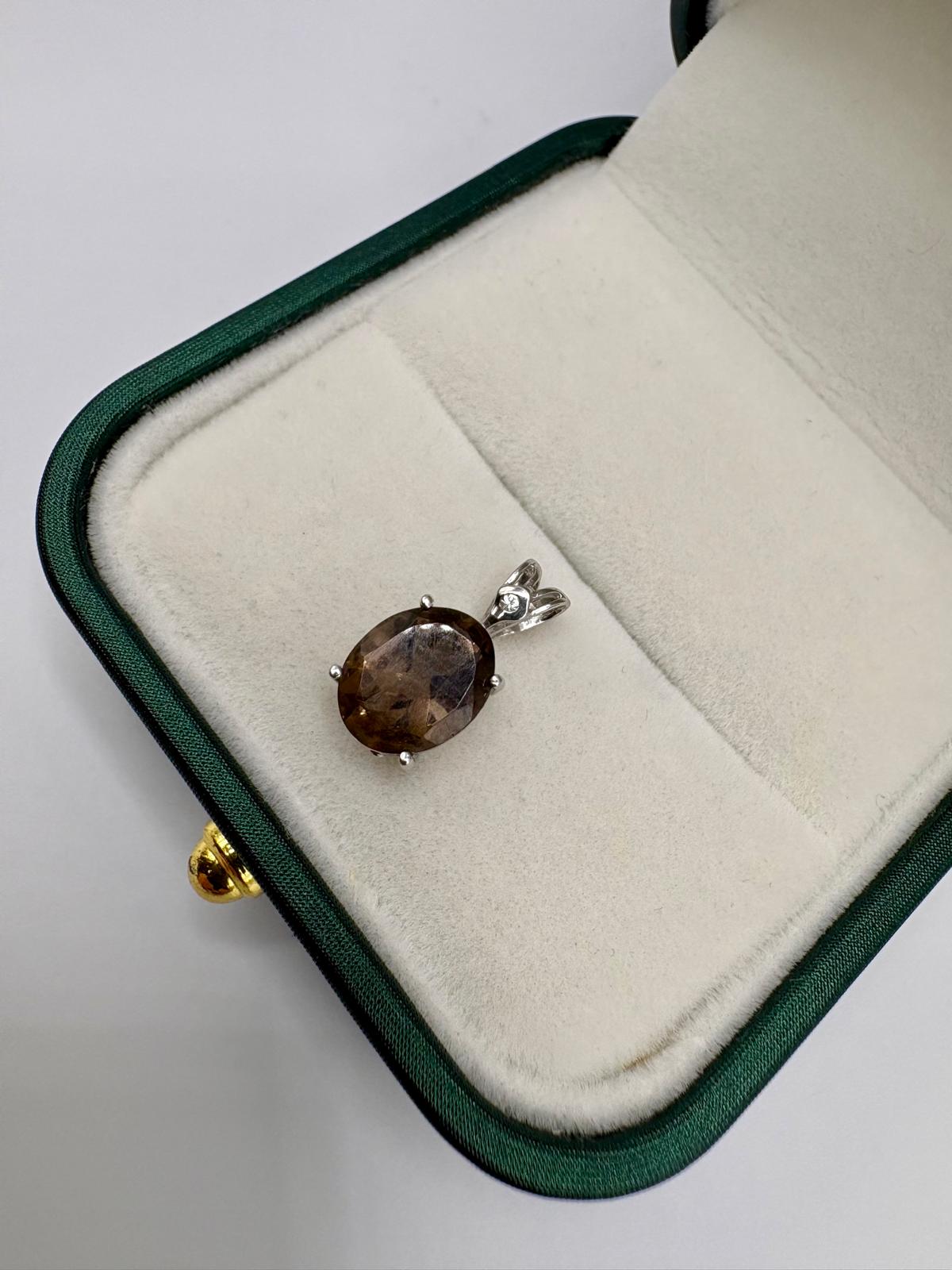 9ct white gold diamond and smokey quartz pendant