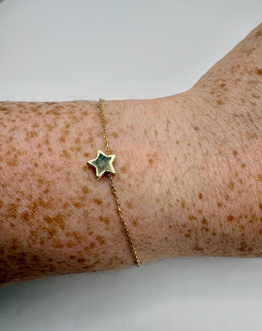 9ct gold star bracelet