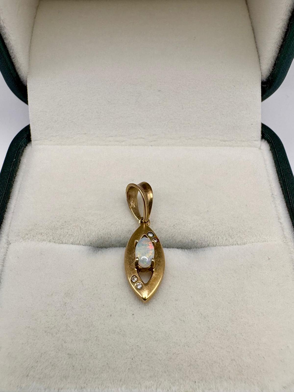 9ct gold opal and diamond pendant