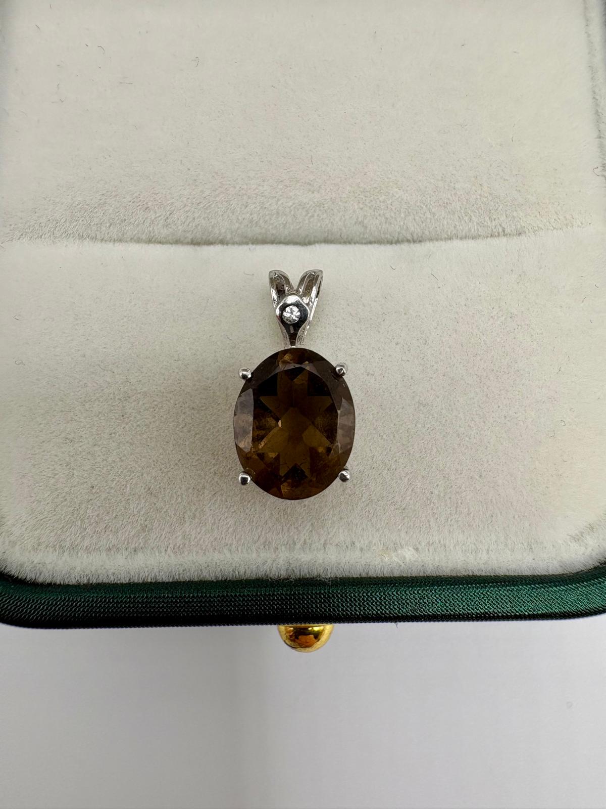 9ct white gold diamond and smokey quartz pendant