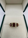 9ct gold garnet trilogy ring
