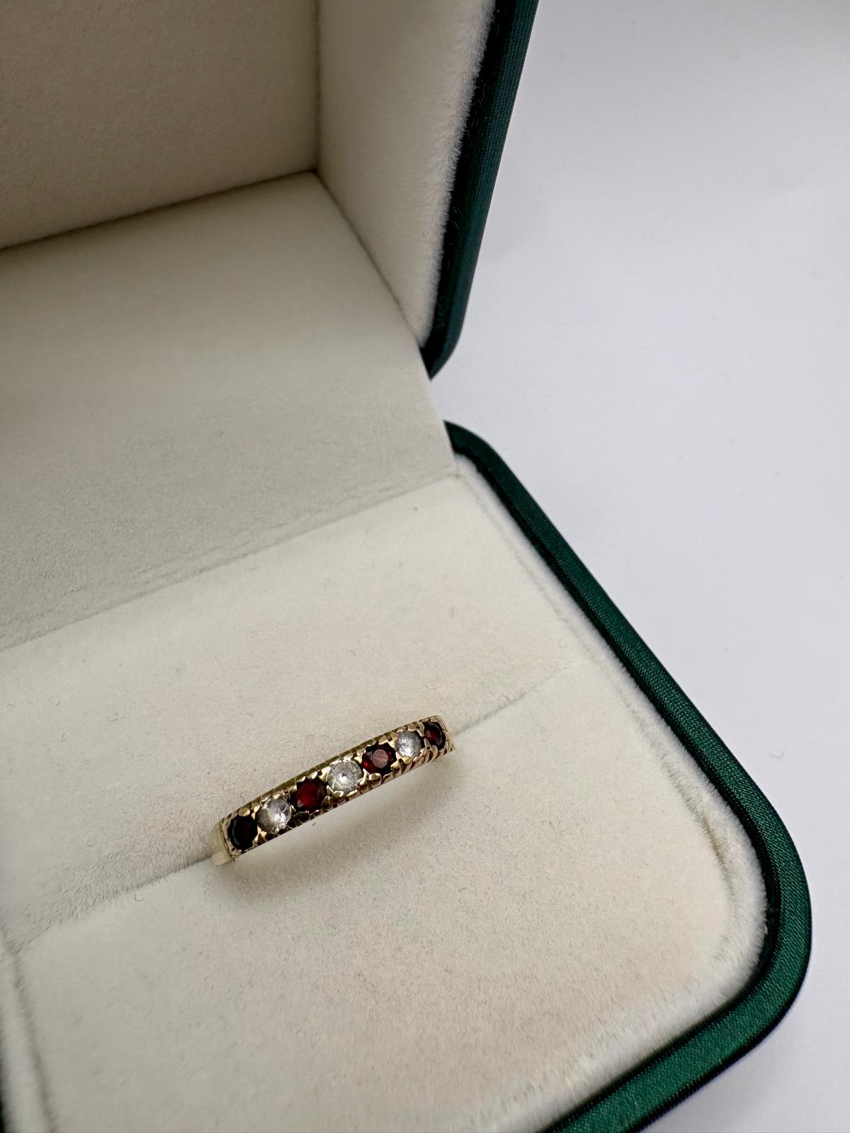 9ct gold garnet and cz ring