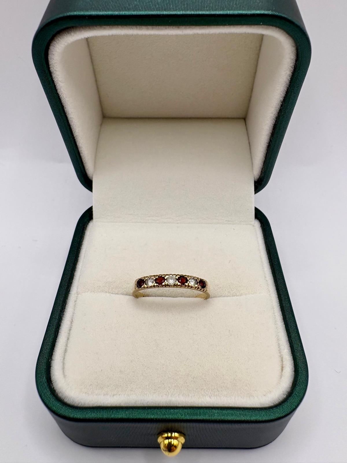9ct gold garnet and cz ring