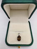 9ct white gold diamond and smokey quartz pendant