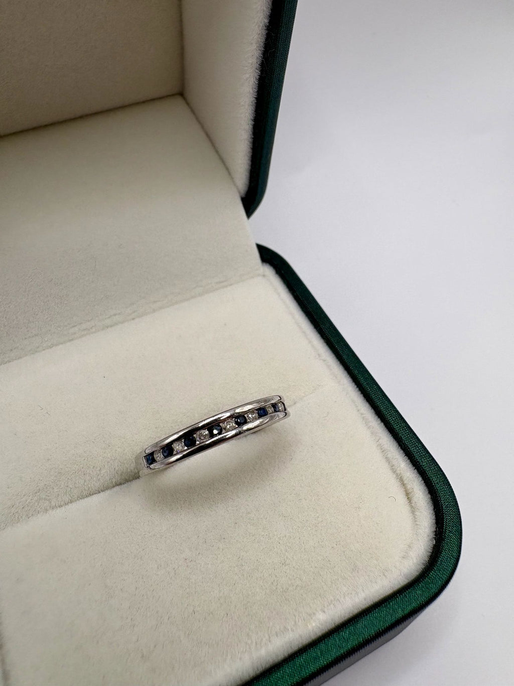9ct white gold sapphire and diamond half eternity ring