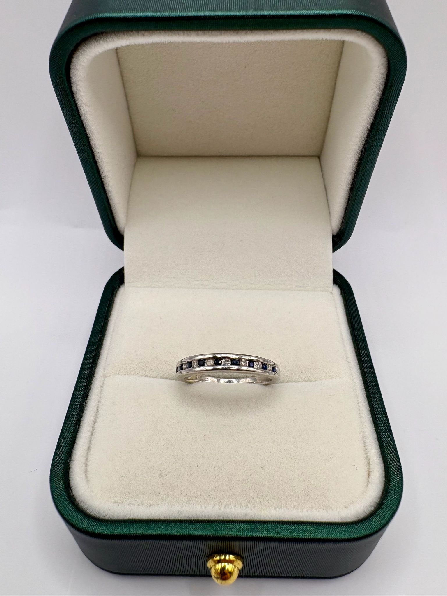 9ct white gold sapphire and diamond half eternity ring