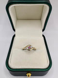 9ct gold ruby and zircon ring