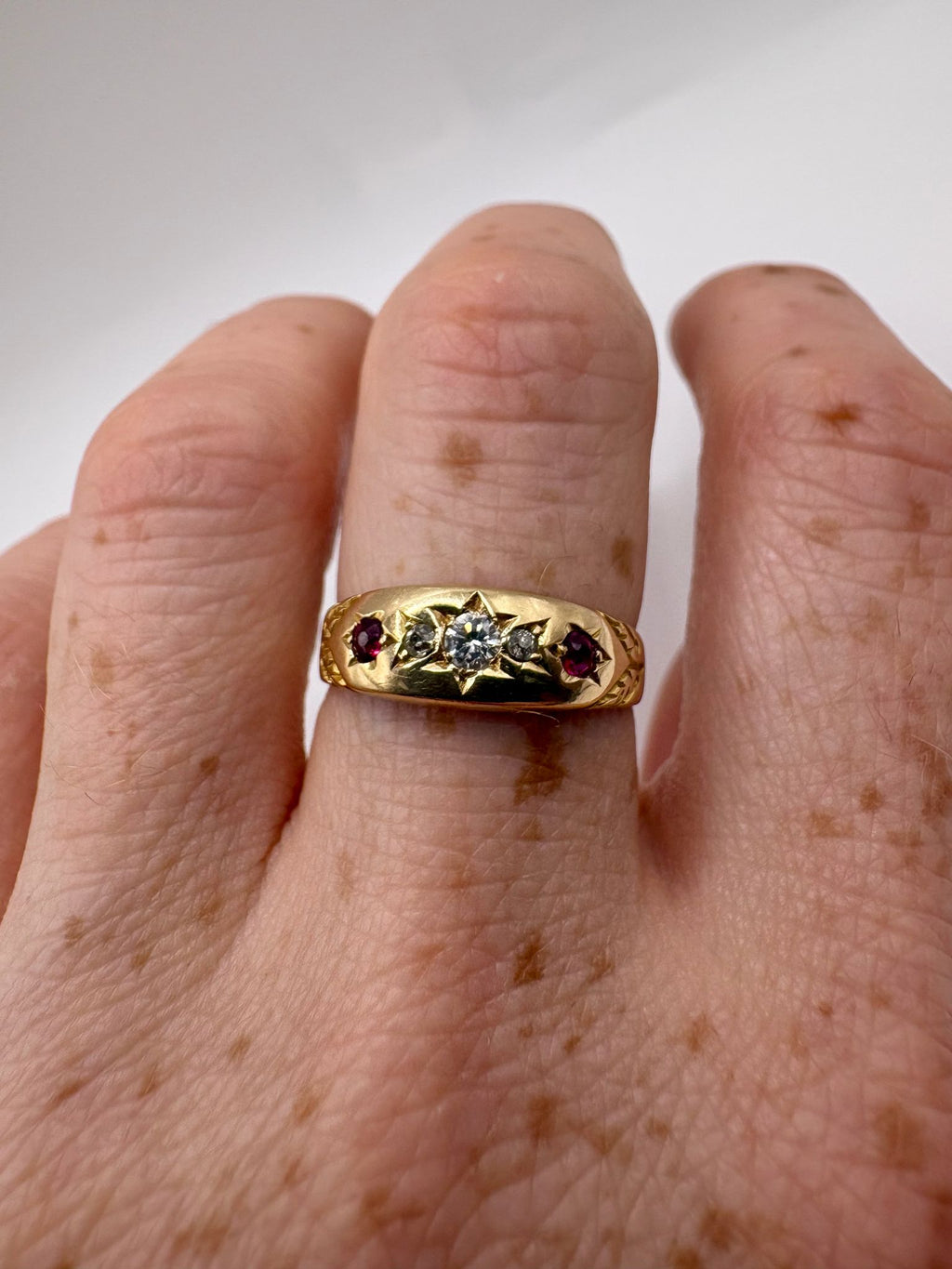 18ct gold ruby and diamond gypsy ring