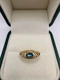 9ct gold topaz celtic style ring